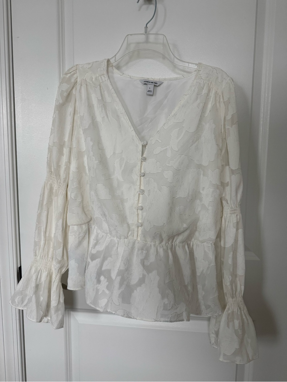 Elizabeth and James Ivory Textured V-Neck Button Peplum Blouse
